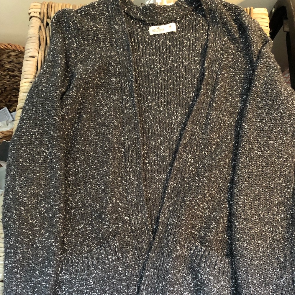 Dark and white colored cardigan